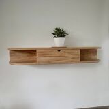 Floating entrance console in solid recycled beech and its practical storage