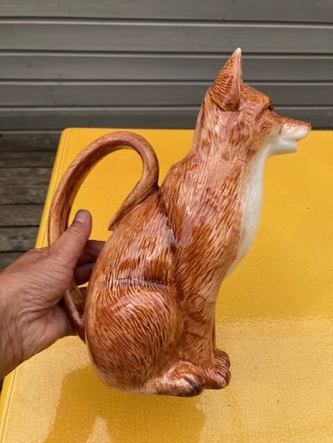 Ceramic jug in the shape of a fox.