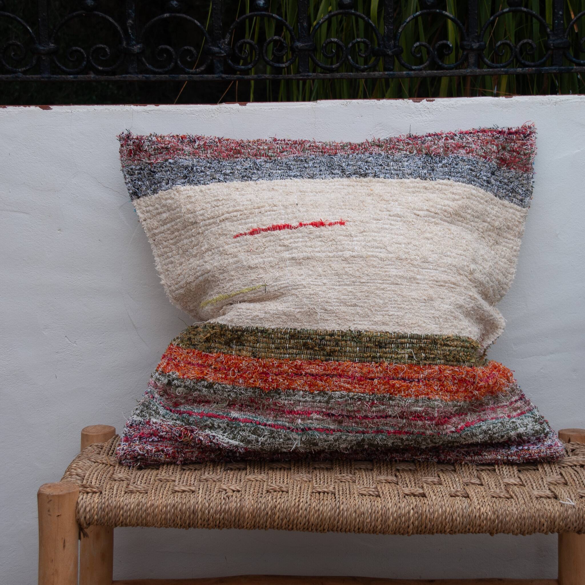 Handwoven cushion cover made from recycled cotton