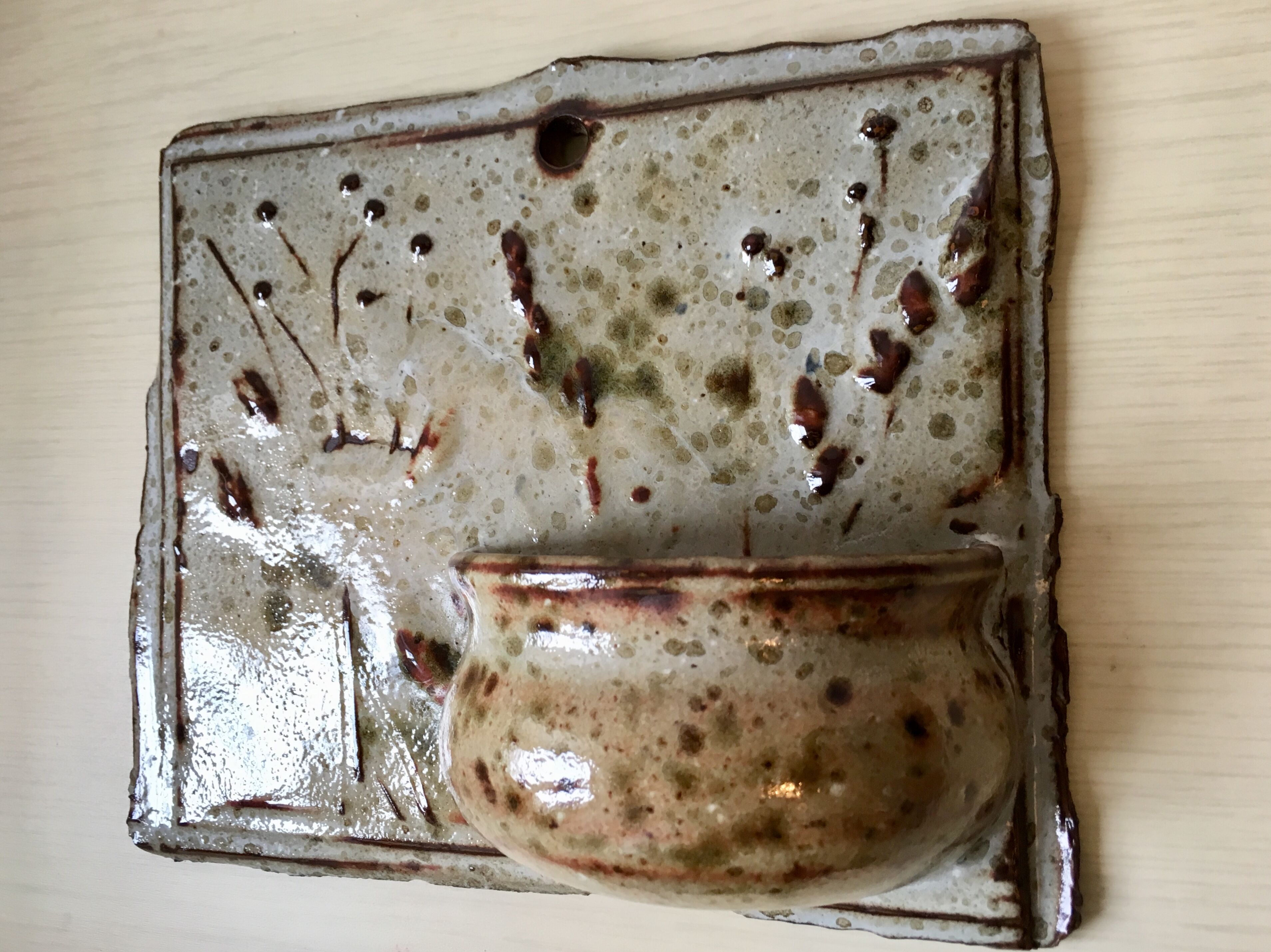 Enamelled sandstone wall flower pot