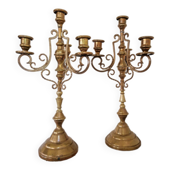 Pair of old candlesticks in brass and gilded copper