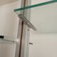 Large Scandinavian wall-mounted wood and aluminum bookcase circa 1960