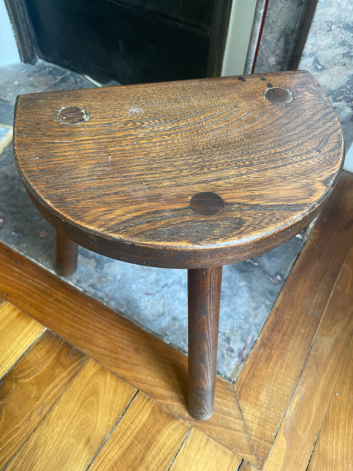 Dark wood tripod stool