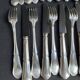 12 Forks and 12 cheese or dessert knives – Orfèvrerie Perrin Paris