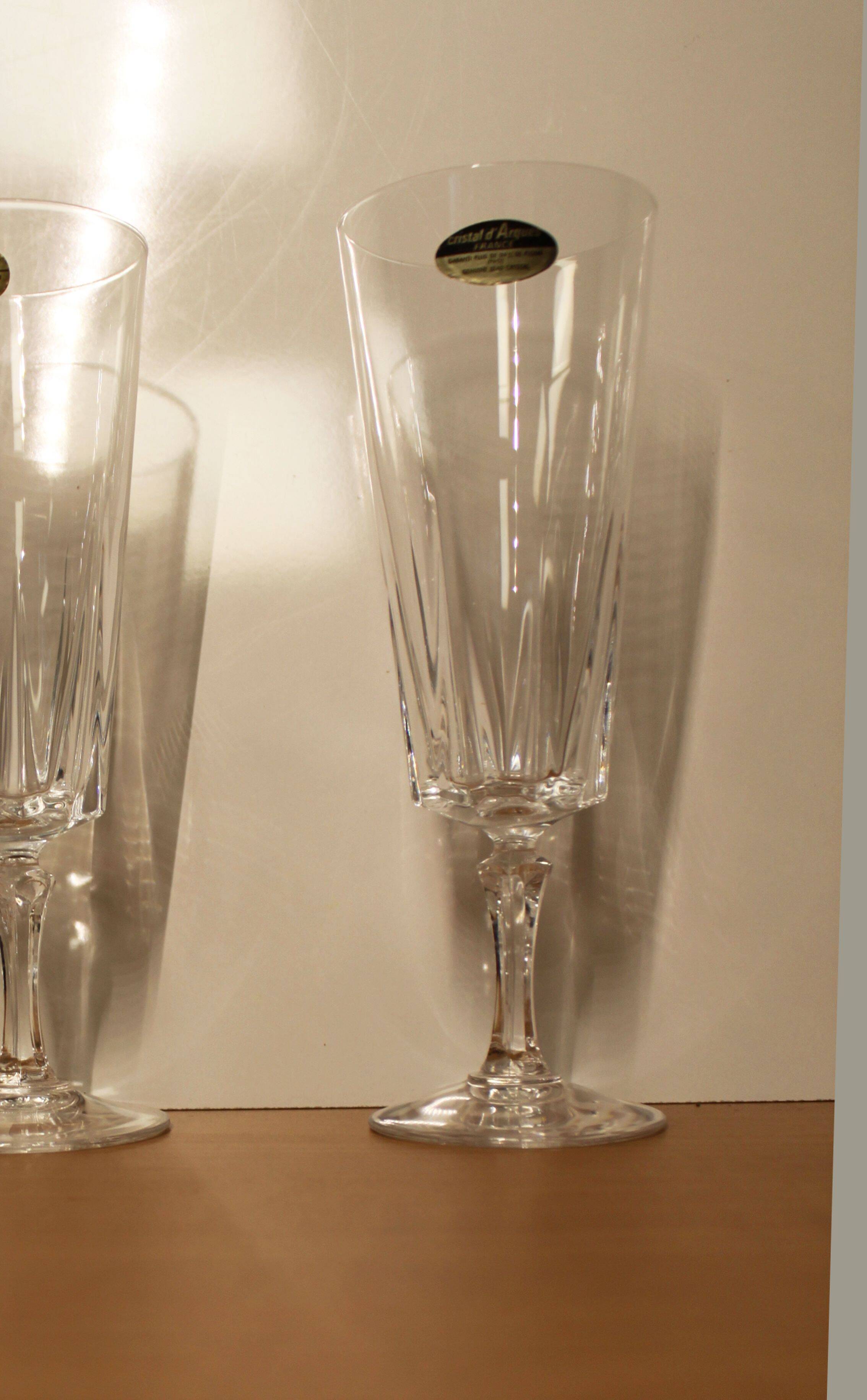Set of 12 champagne flutes, “Versailles” model, Cristal d'Arques, 70's.