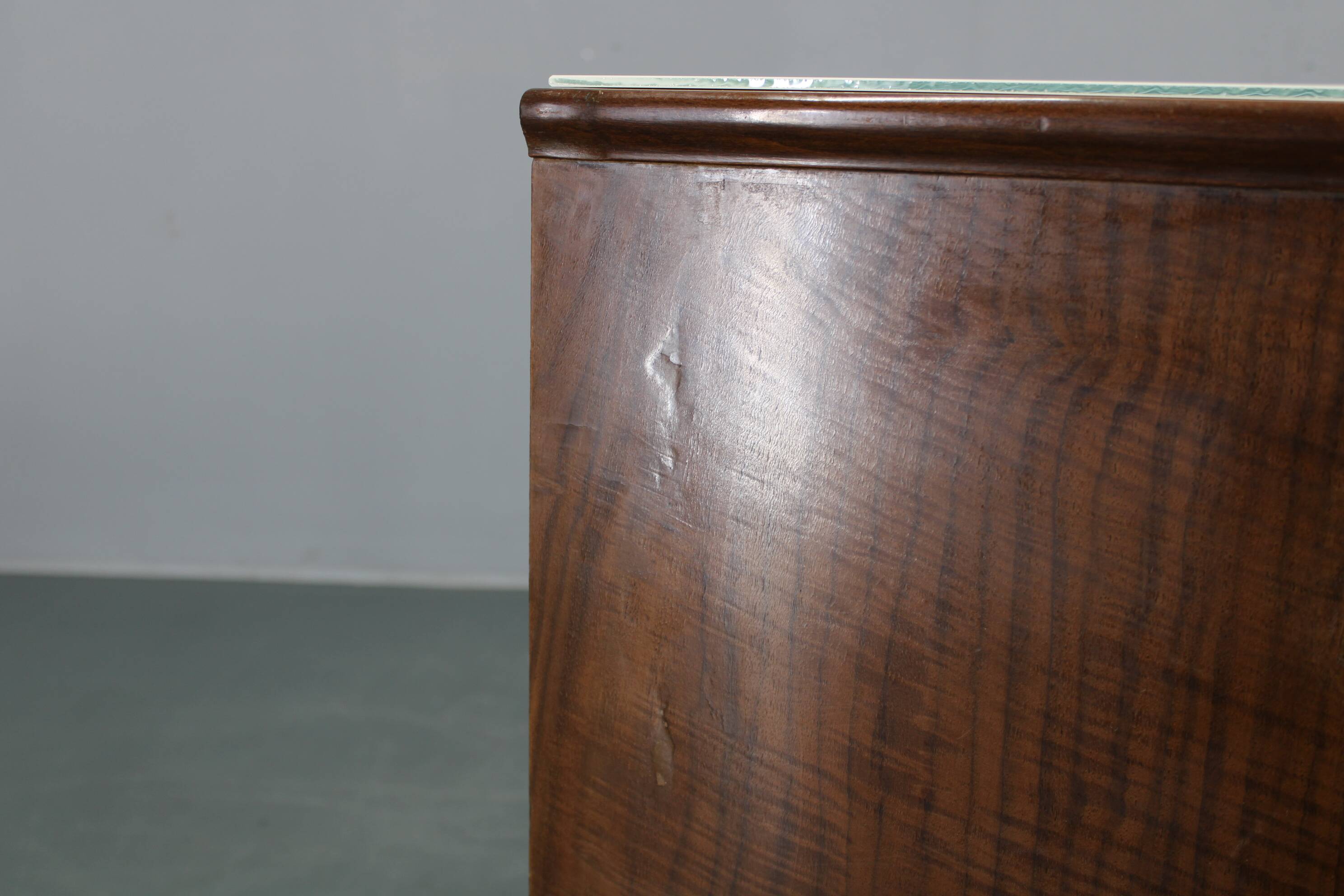 Pair of mid-century Italian walnut nightstands with glass top, 1950s