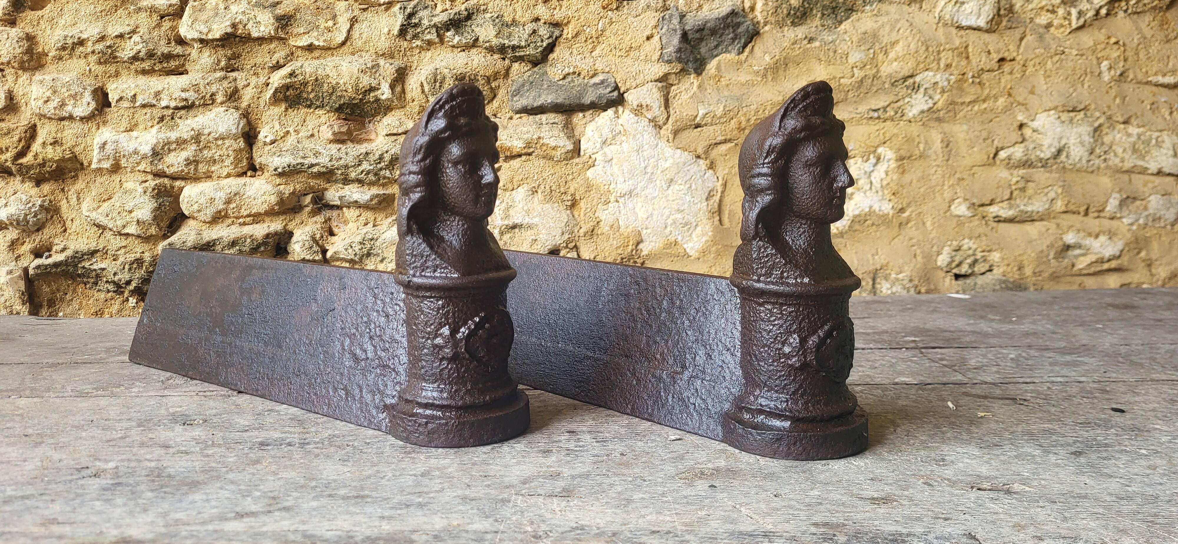 Pair of cast iron andirons from the 19th century