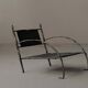 Fauteuil bas en fer forgé martelé, France, vers 1960