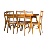 Table with extensions and vintage chairs