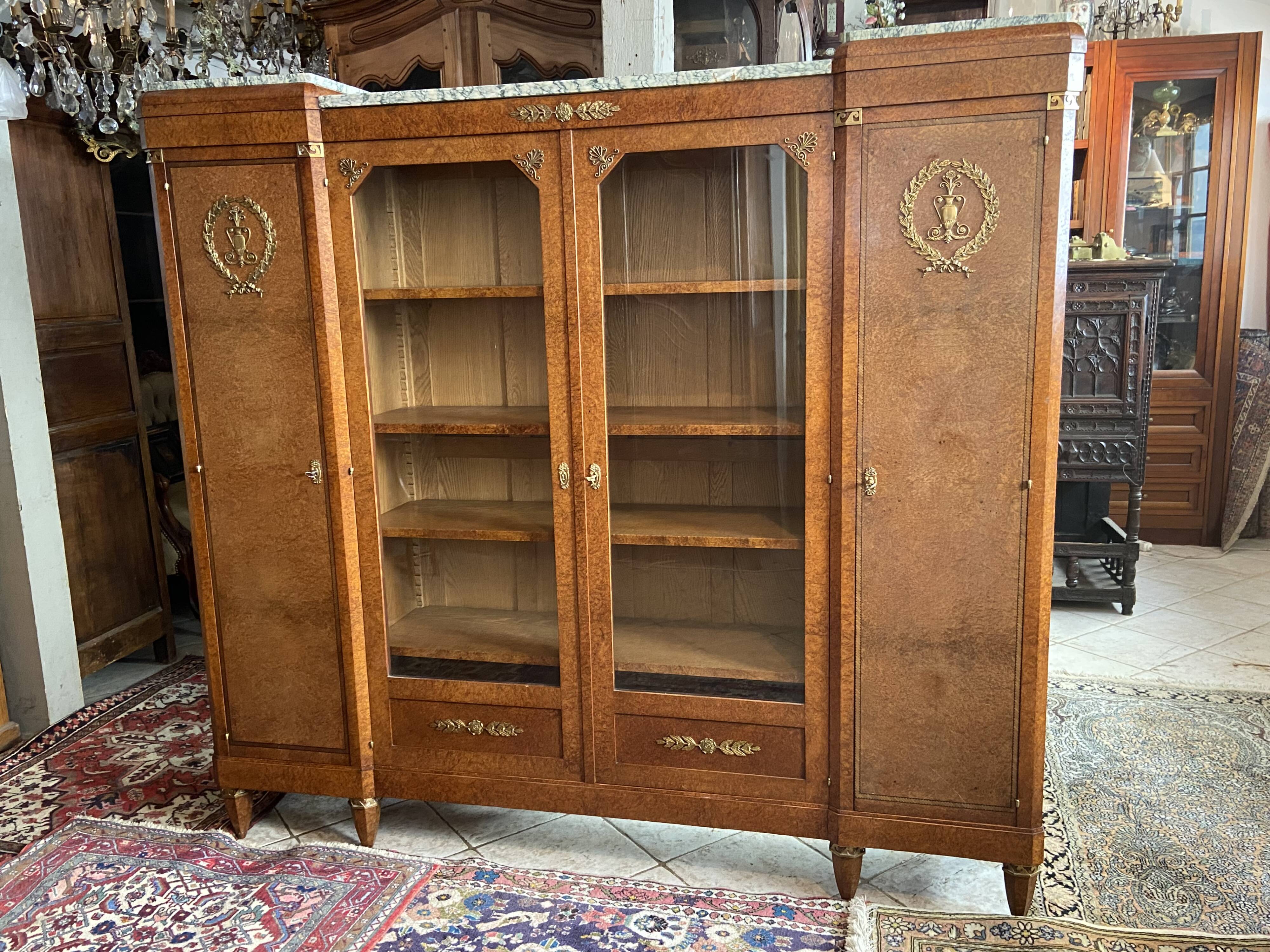 Showcase library in Neoclassical style, 1930, walnut burl and bronze.