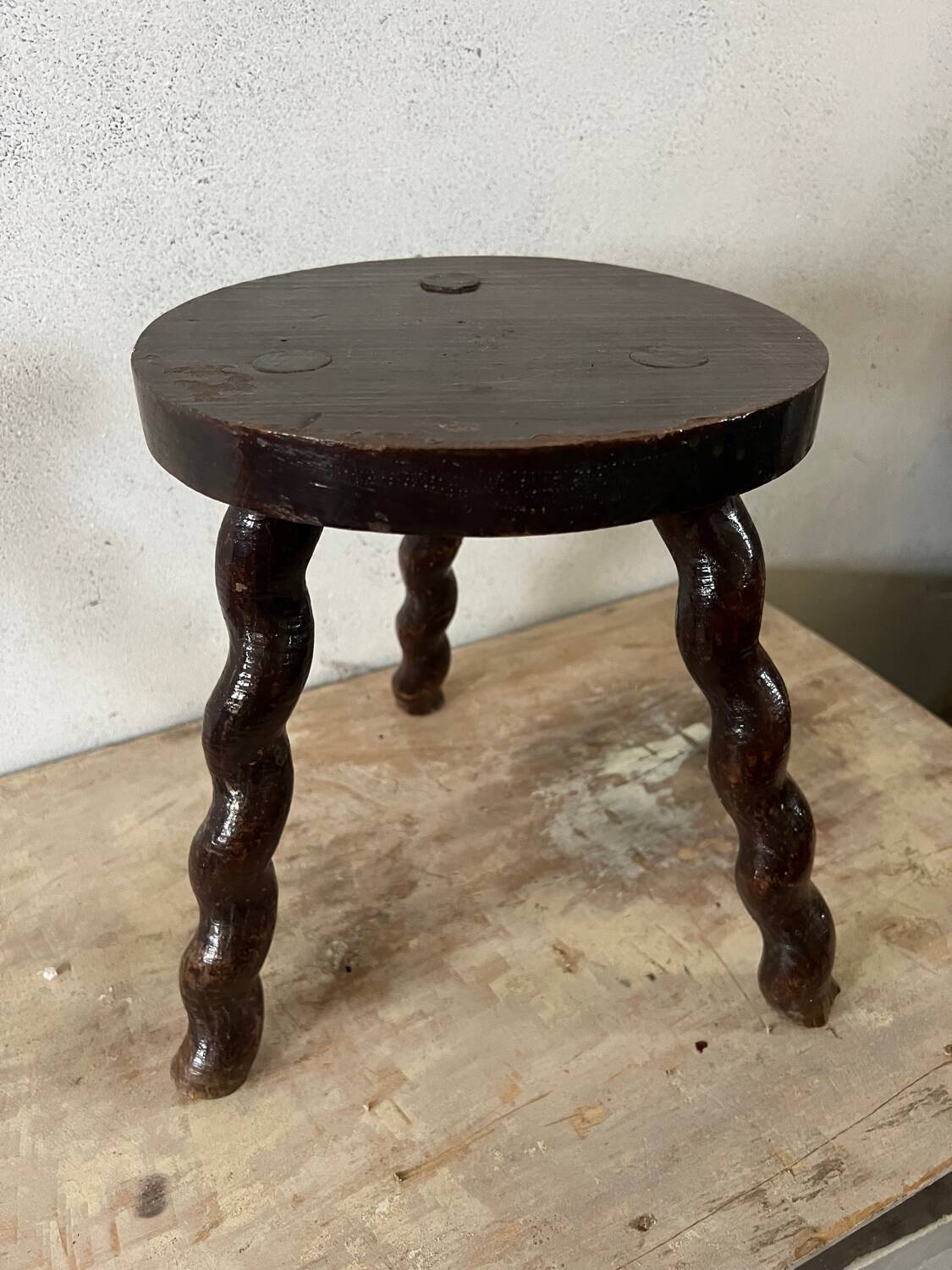 Wooden tripod stool