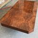 élégante table basse en loupe d'orme 1970