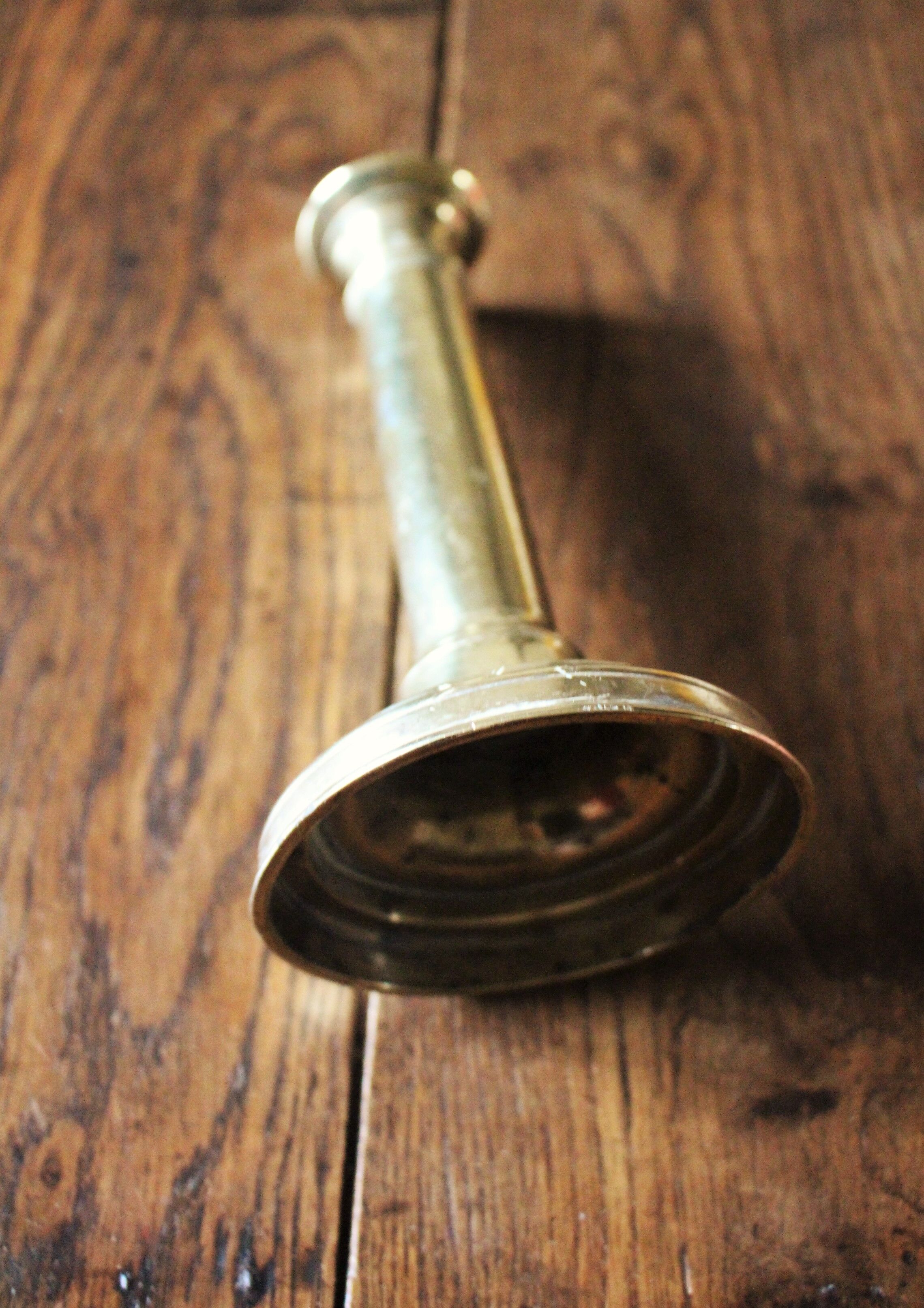 Brass torch candle holder