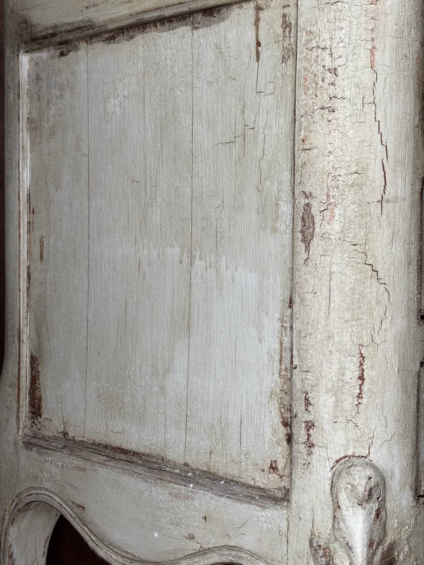 A pair of distressed bedside tables.
