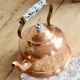 Vintage kettle in copper and ceramic