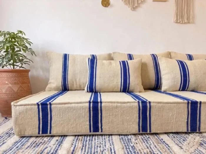 Royal blue striped floor cushion – Hanbel in handwoven ivory wool