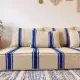 Royal blue striped floor cushion – Hanbel in handwoven ivory wool