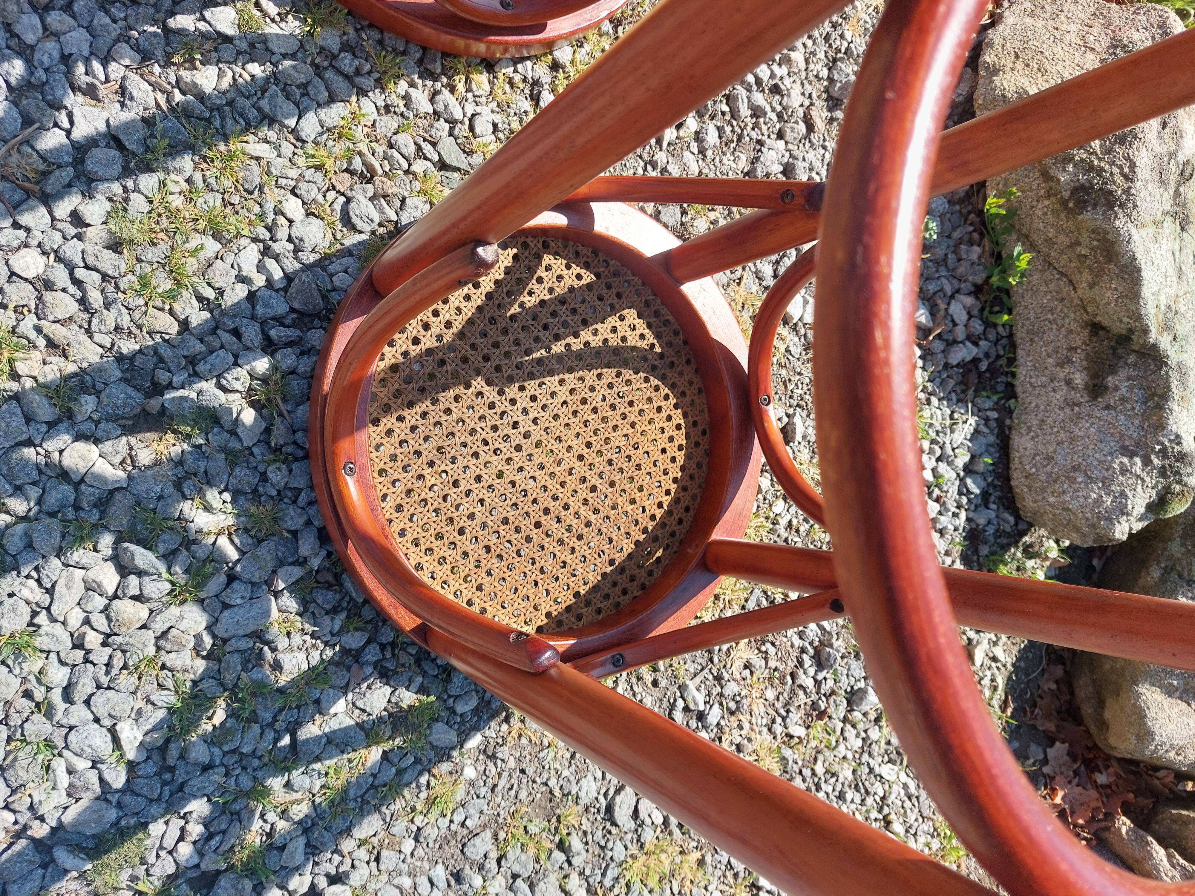 3 wooden and cane bar stools