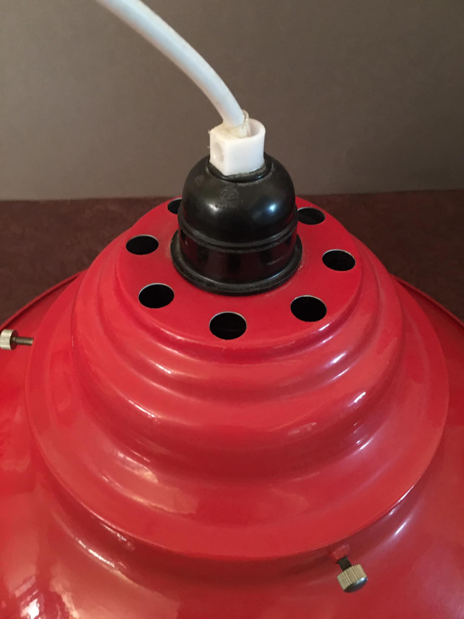 Industrial suspension in red metal