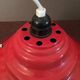 Industrial suspension in red metal