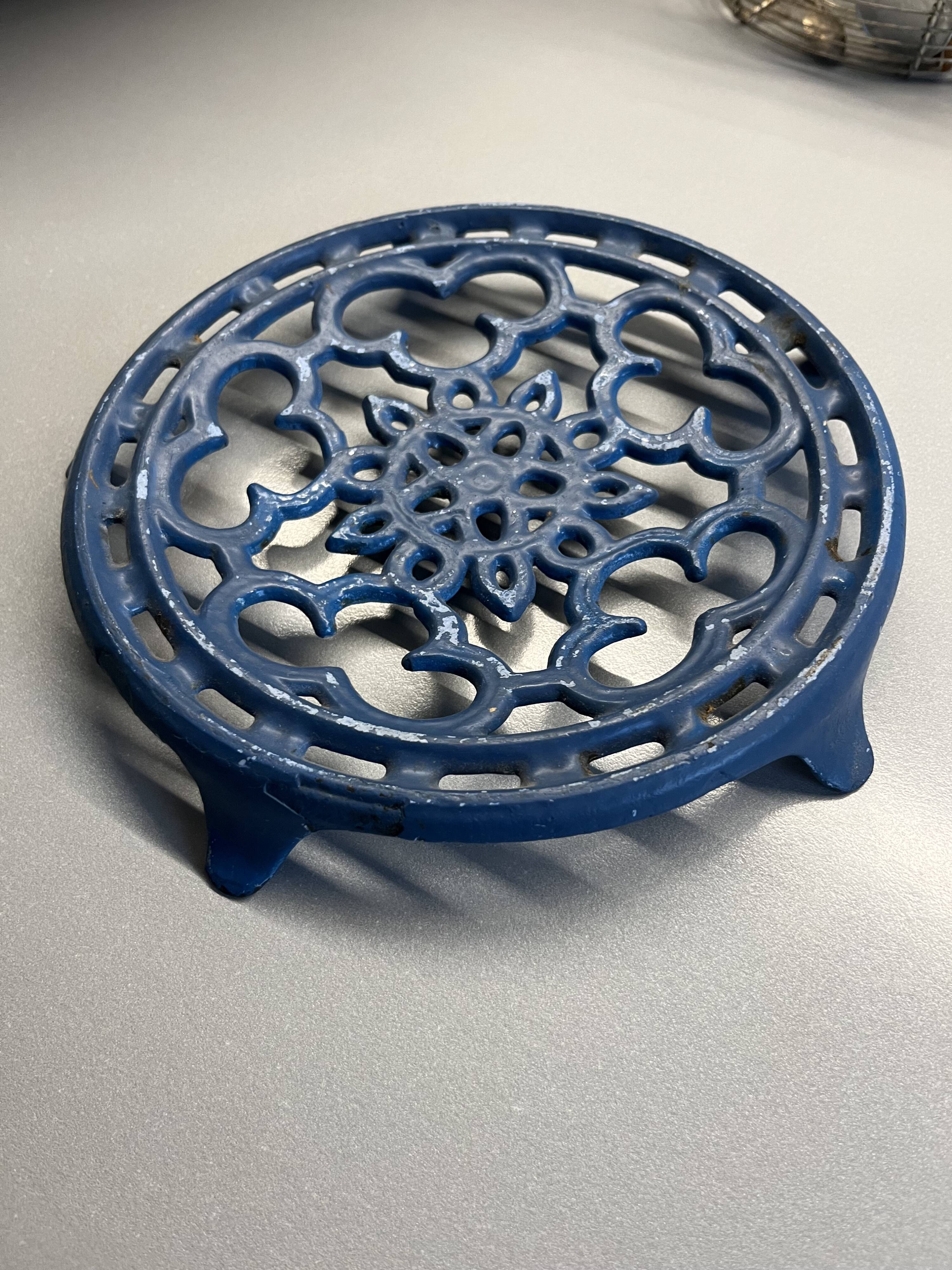 Old blue cast iron trivety