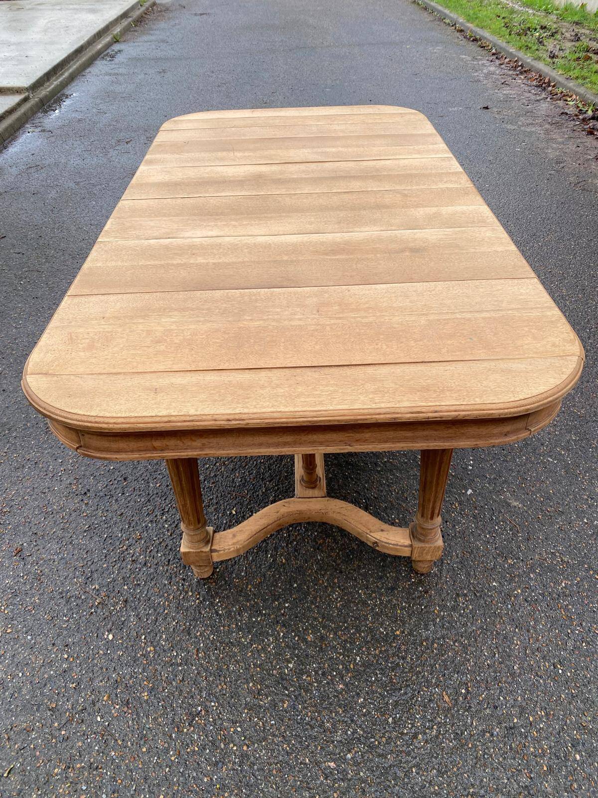 Renovated dining table in solid oak from the 19th century in Napoleon III style.