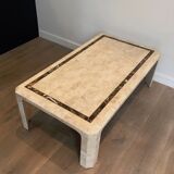 Coffee table made of marble plates with inlay of a brass net. French Work