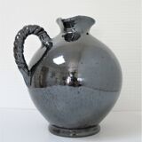 Black pearl glaze ceramic pitcher by Reinhold Rieckmann signed
