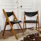 2 folding chairs wood and skaï
