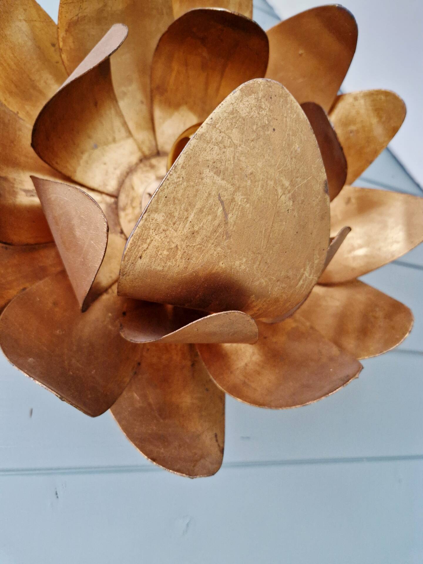 Gold metal floral wall light, 1960-70.