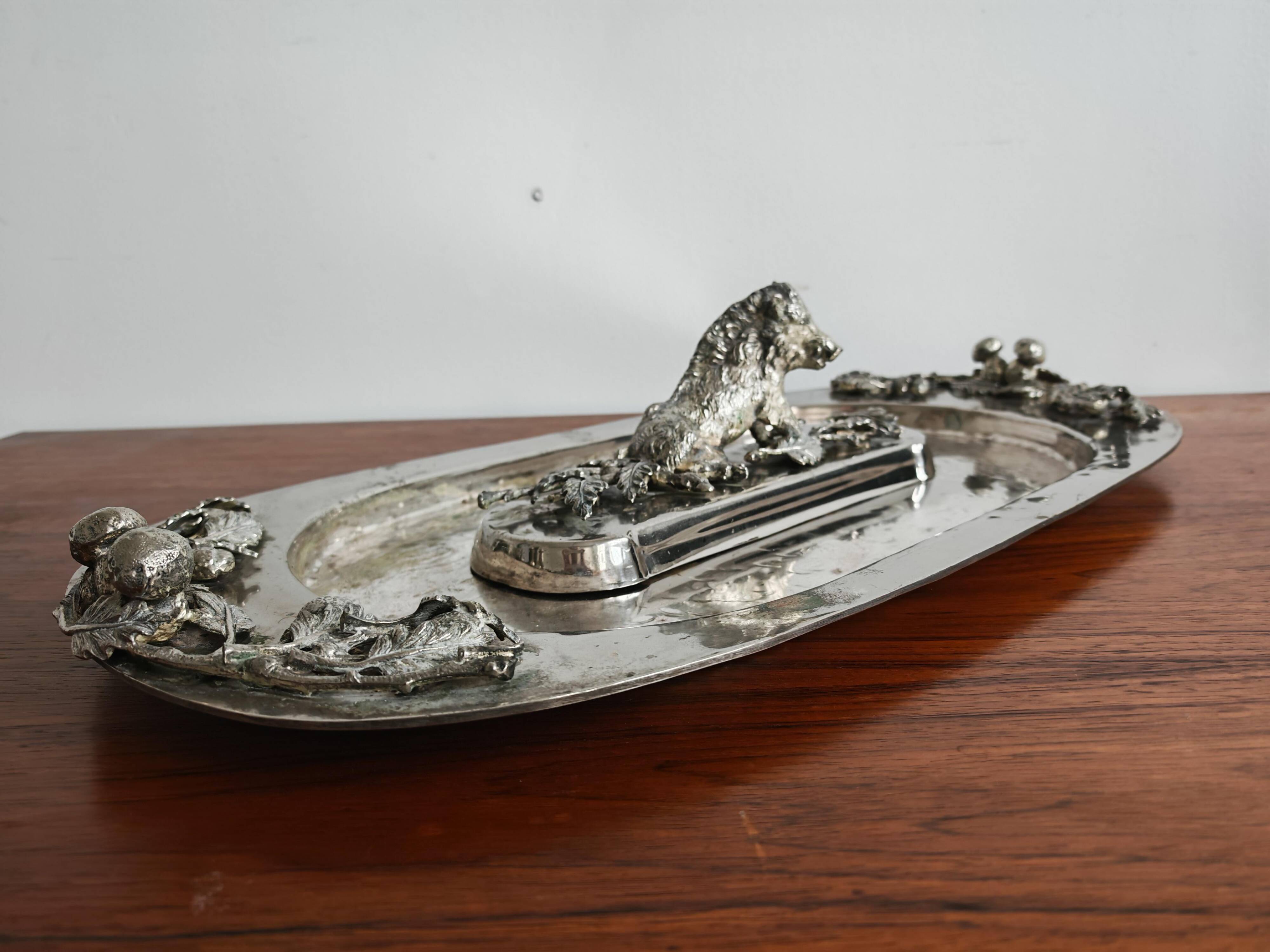 Silver serving dish by Franco Lapini with boar sculpture.