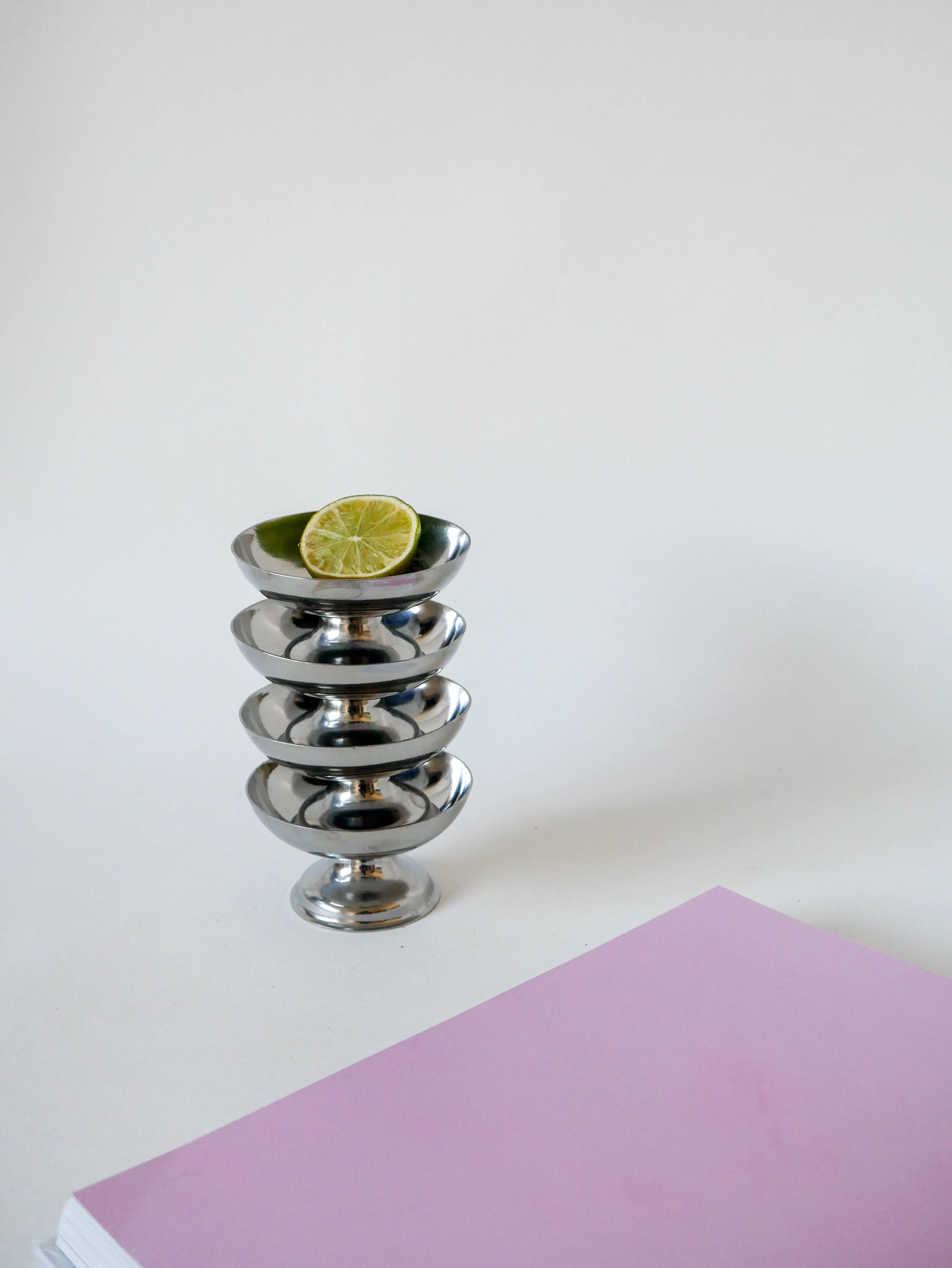 Set of 4 low stainless steel bowls 1970 9 x 5 cm