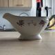 Vintage sauce boat L'Amandinoise 1080 with roses and gilding.
