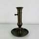 Vintage brass candlestick that raises and lowers.