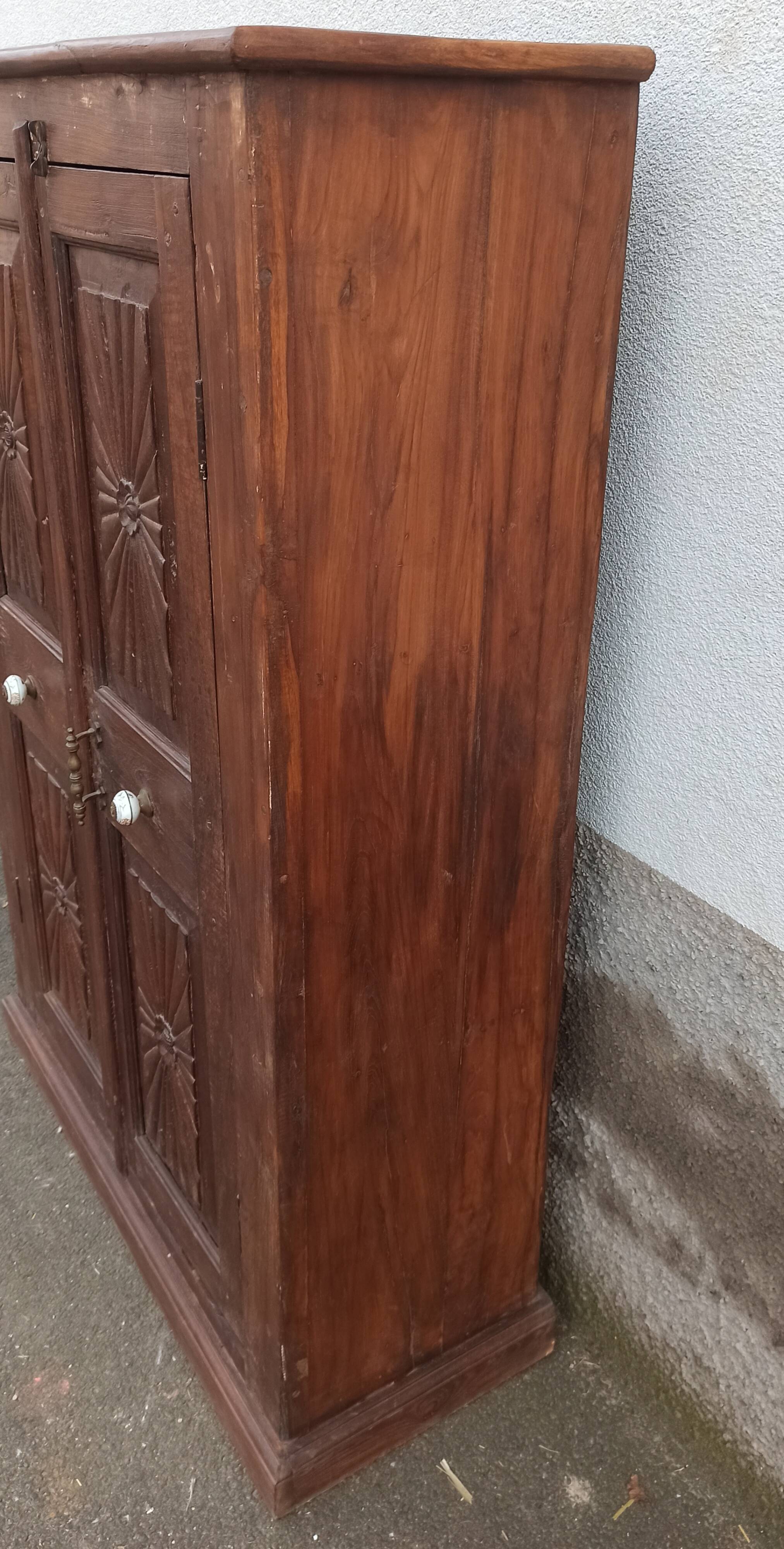 Old wooden cabinet with ceramic handles