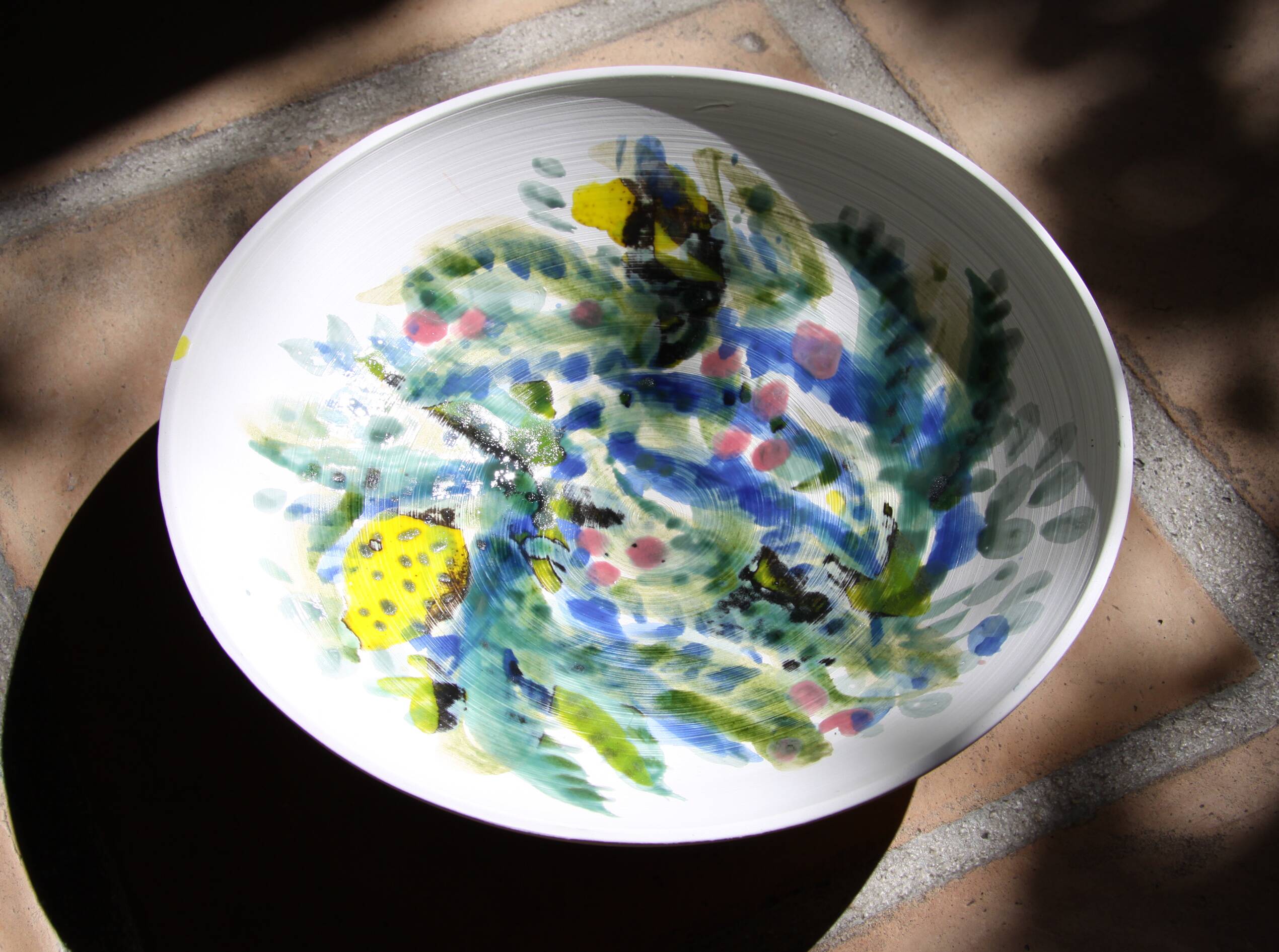 Decorated white earthenware fruit bowl