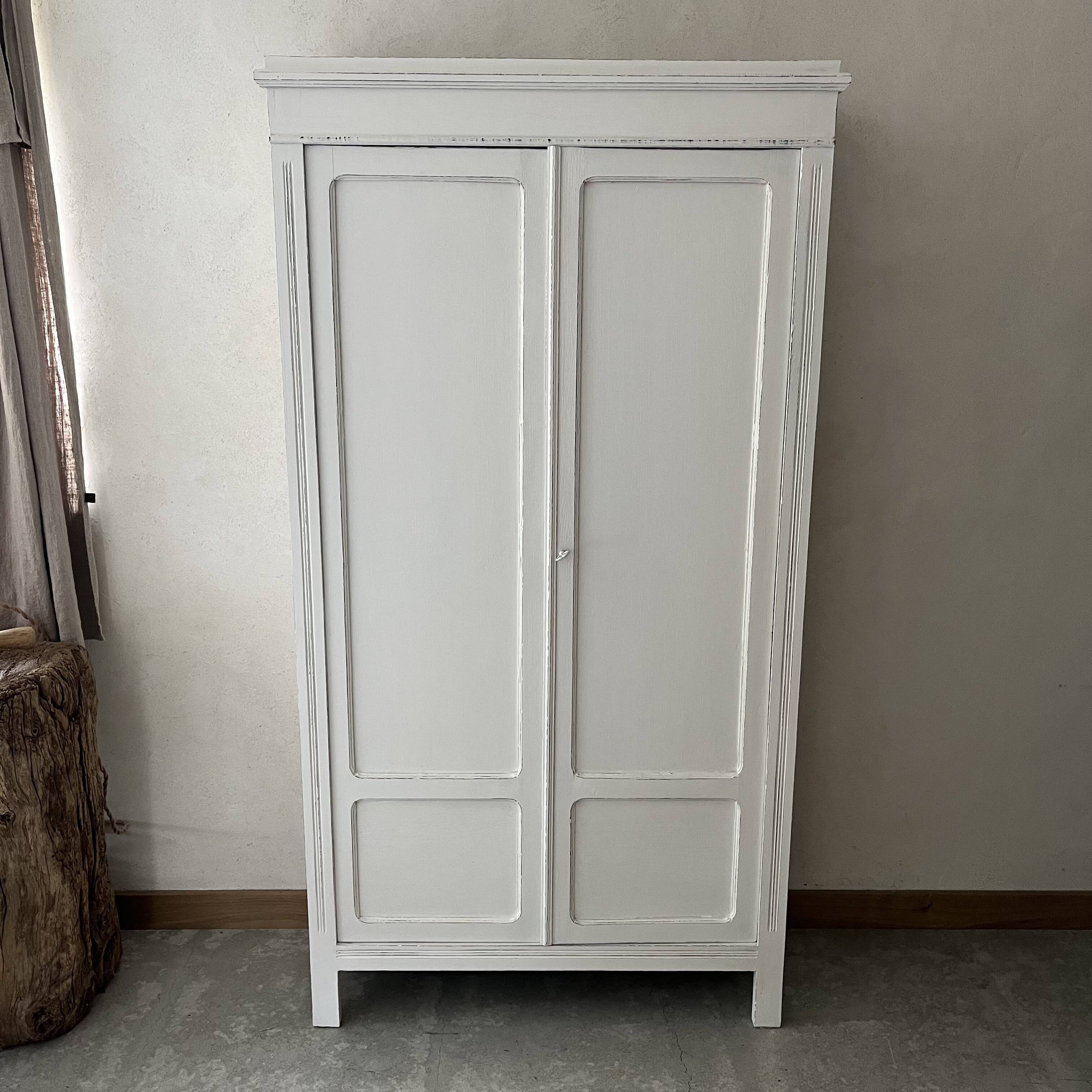 White patinated wardrobe