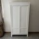 White patinated wardrobe