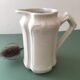 Antique ivory-coloured porcelain vase/pitcher
