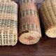 Set of three vintage rattan bottles