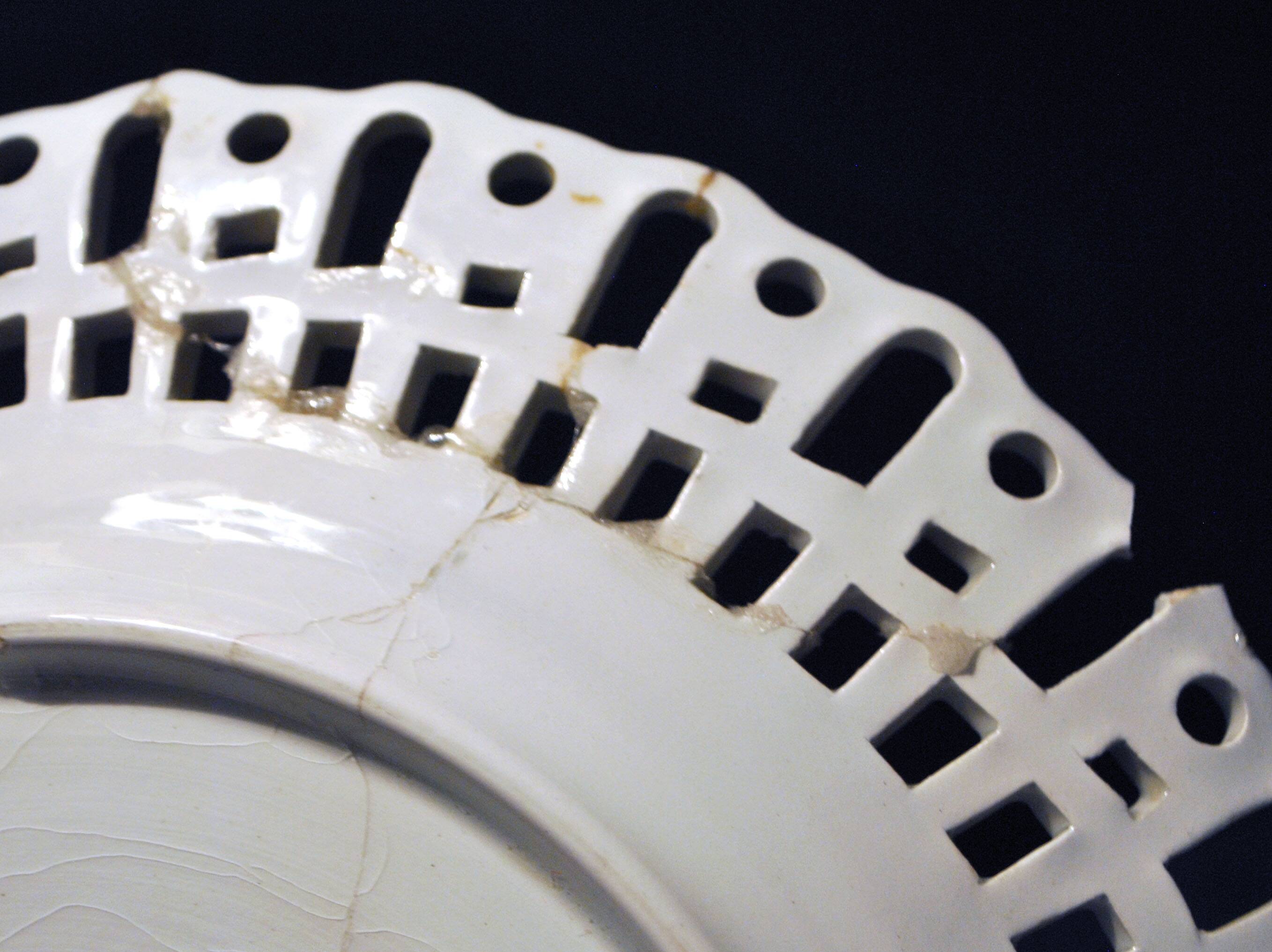 Painted collector's plate with openwork edge epinal by henri schmitt 1900