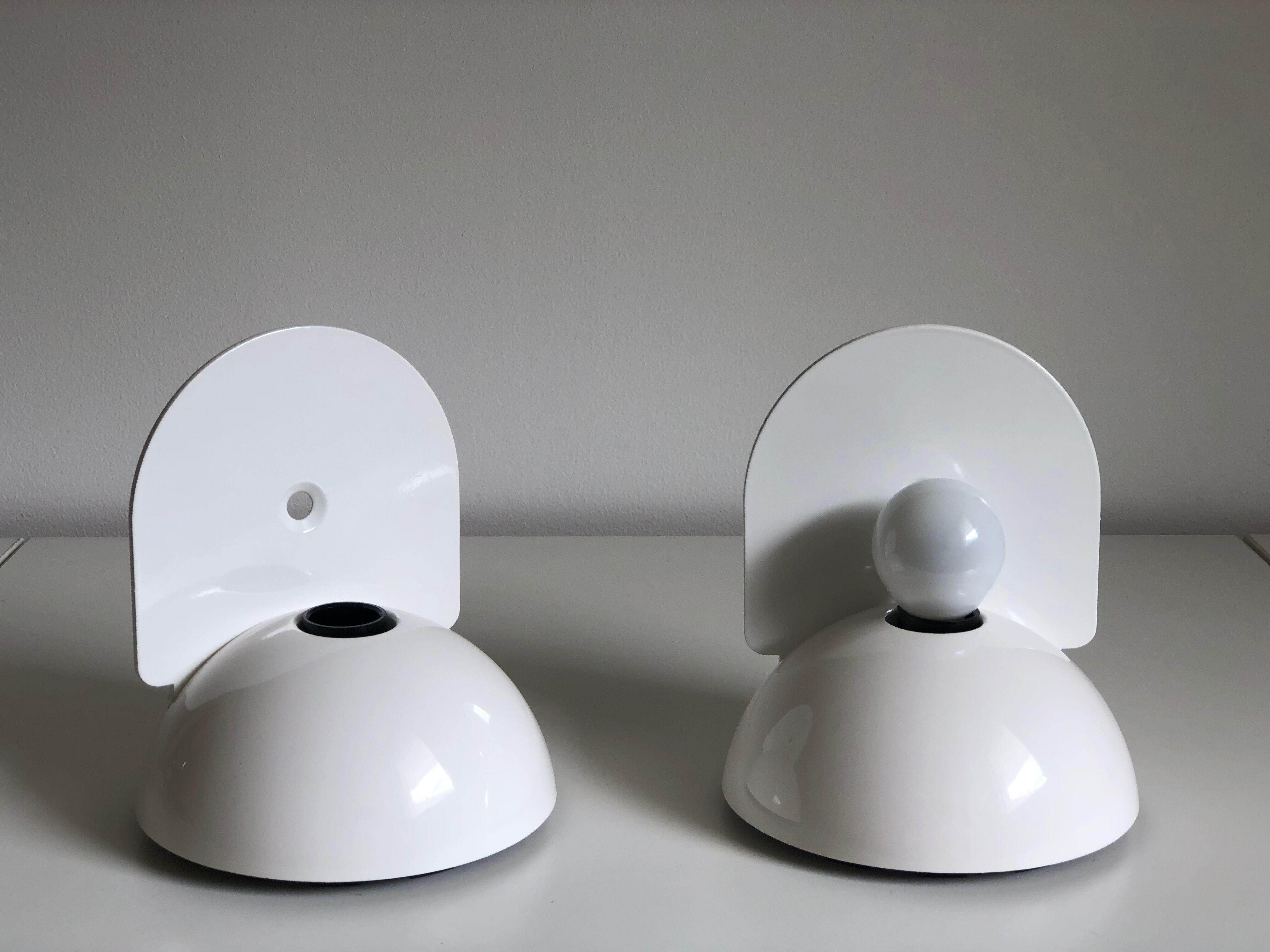 White Buco applior by Claudio Dini edited by Artemide, 1974