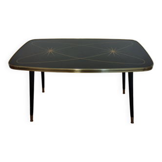 Coffee table with compass legs