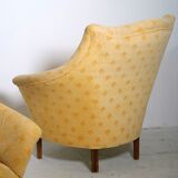 Pair of yellow vintage armchairs