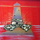 Art deco tray decorated with a lighthouse and seaside