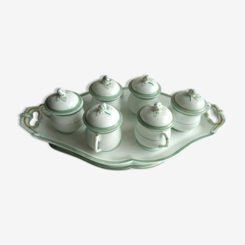 Porcelain cream service of Paris 1850, 6 pots on green and gold oval tray