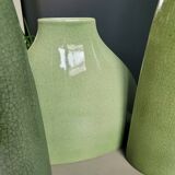 Trio of green enamelled vases