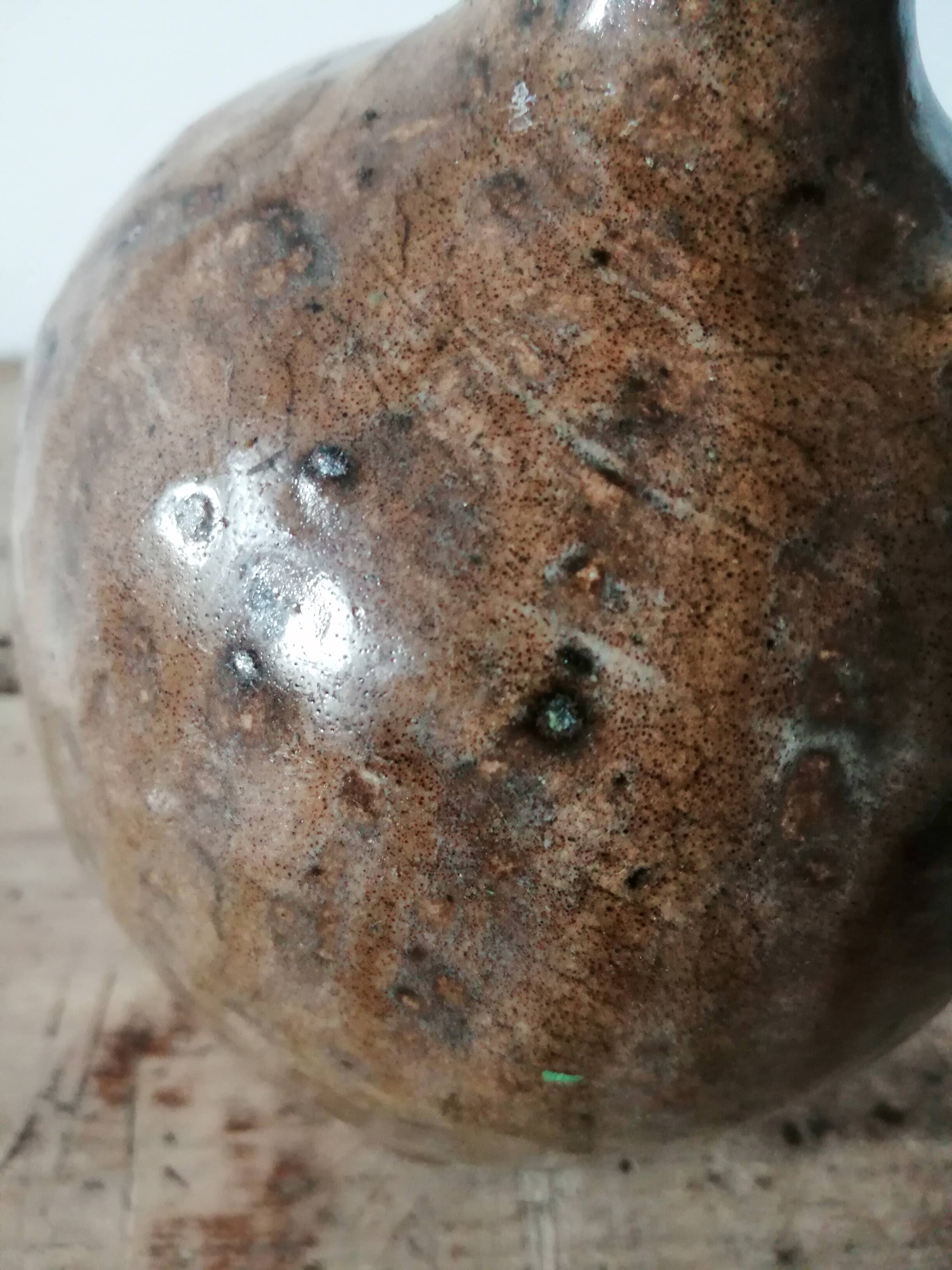 Small very old glazed jug