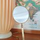 Vintage midi century brass barber mirror