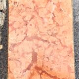 Coffee table with curved legs and pink marble top
